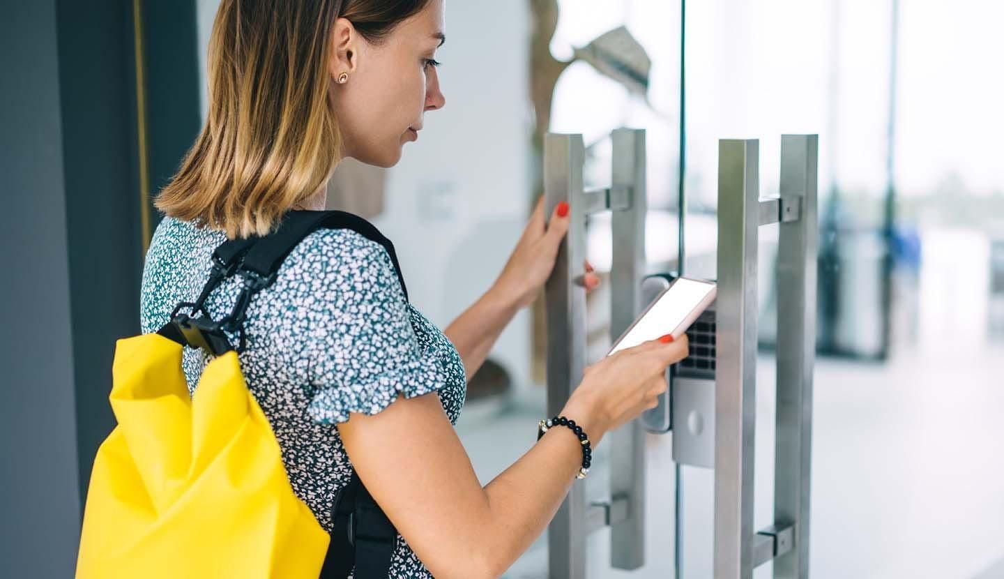 unlocking smart lock during self-guided tour